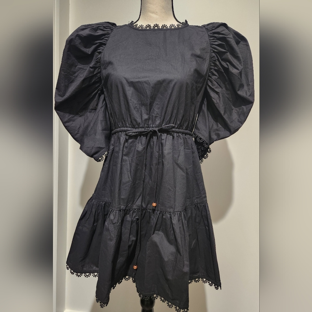 Chic Black Puff Sleeve Dress 100%cotton outer 100%rayon lined.